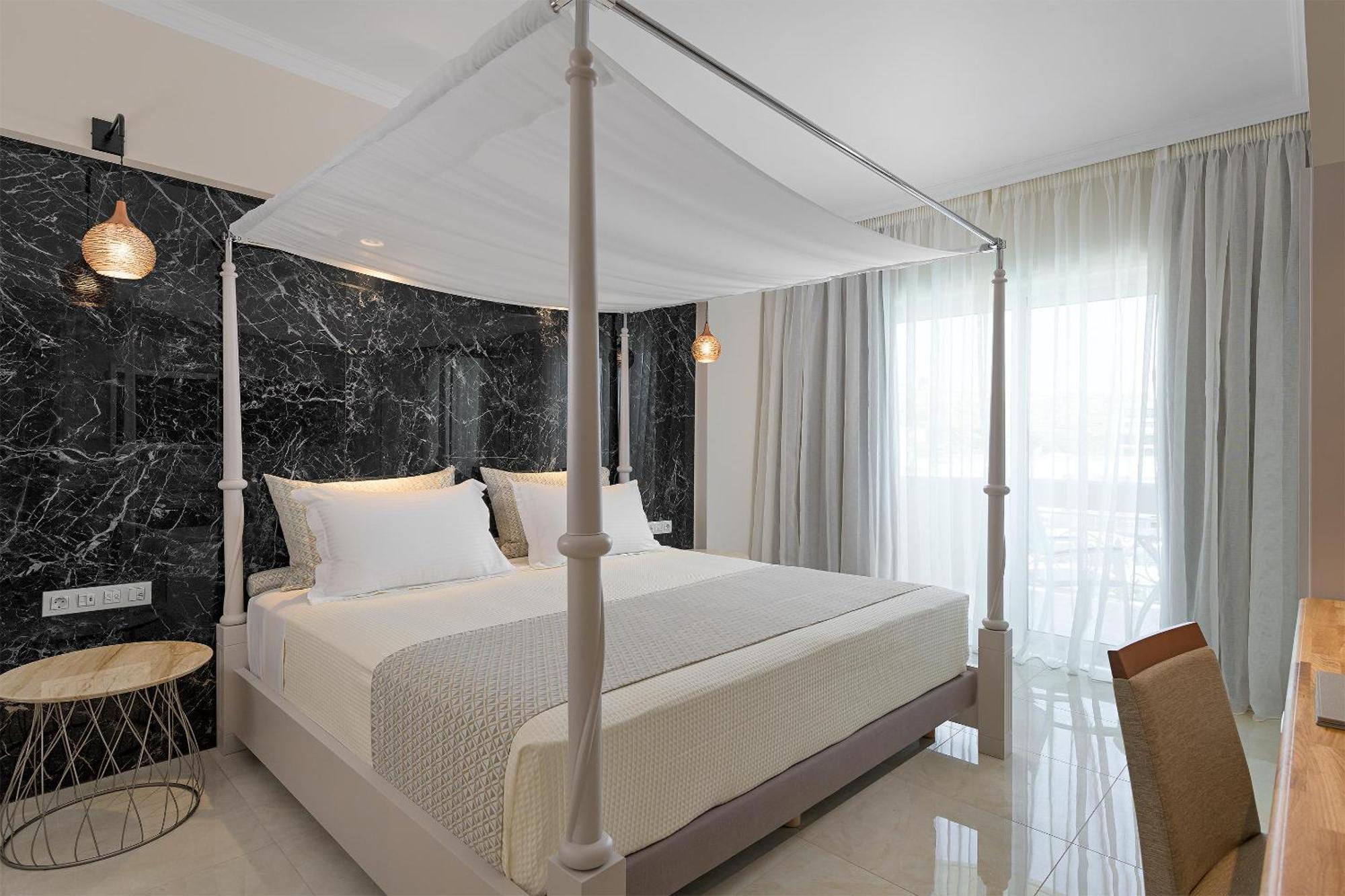 罗德斯帕拉蒂姆休闲及健康酒店 Kallithéa 外观 照片 A bedroom at the hotel